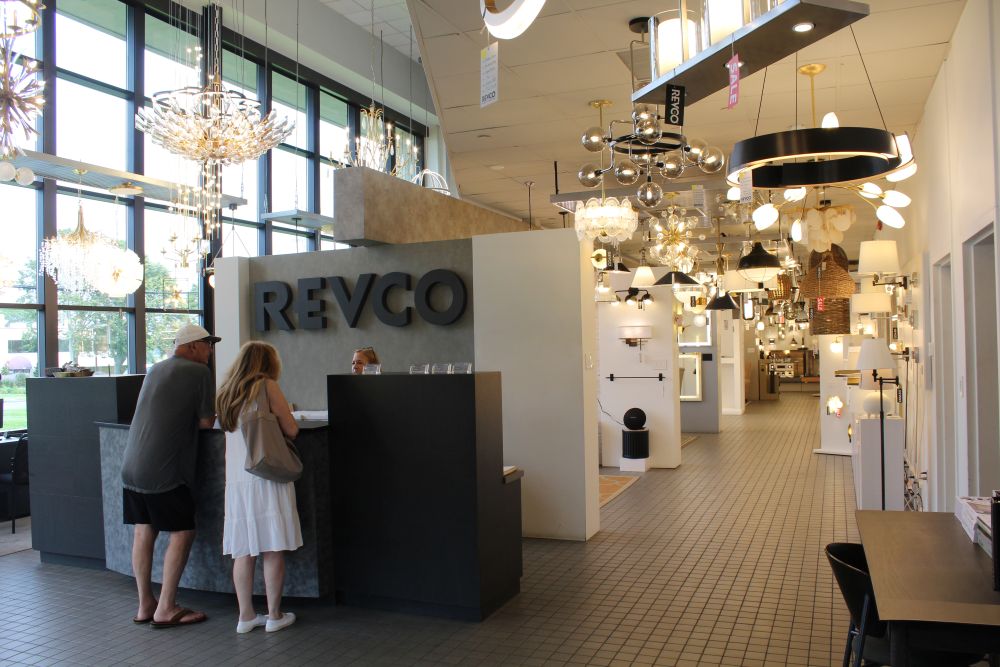 Revco Southampton lighting specialist reviewing fixture options with customers